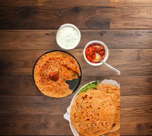 Plain paratha  chola or curd