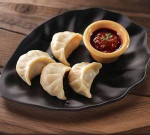 Chicken cheese momos