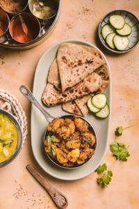 Aloo jeera with 3 butter paratha