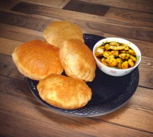 Dry aloo with 5 Poori + Achar