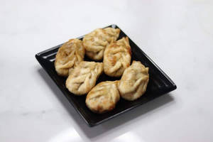 Veg Fried Momos ( 10 Pcs )