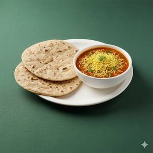 Sev tamatar + 1 Tandoori Roti