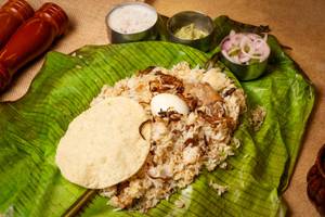 Malabar Mutton Pothi Biryani Banana Leaf [Kaima Rice]