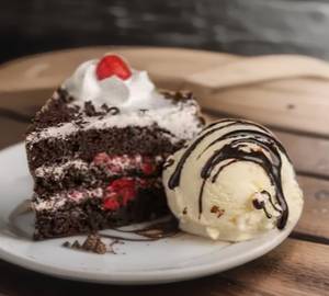 Black Forest Cake With Icecream And Chocolate Sauce