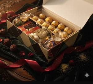 Tea Time Cake [400 G], Date Laddus [100 G], Trail Mix (Spicy Makhana And Nuts) And 2 premium candles