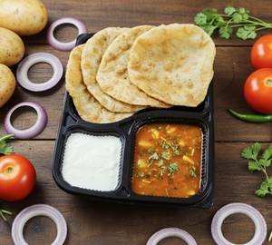 4 Poori With Aloo Tamatar Sabji And Curd