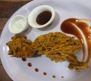 Crispy chicken lollipops