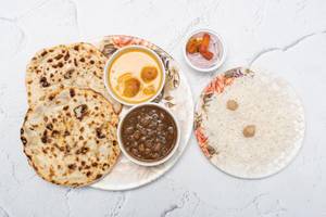 2 Pcs Chola Aloo Kulcha With Kadhi Rice