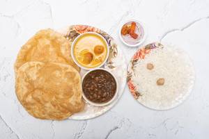 4 Pcs Chola Bhatura With Kadhi Rice
