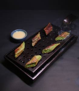 Pistachio Kebab Drapped In White Chocolate