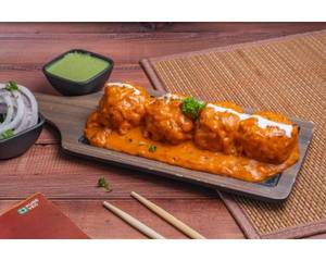 Exotic Veggie Lababdar Momos