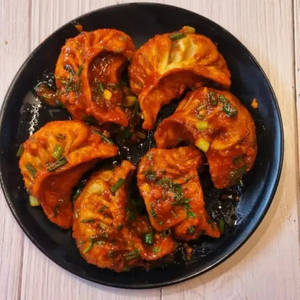 Pan Fried Schezwan Momos ( 6 Pcs )