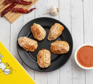 Steamed Chicken Schezwan Momoss (5 Pcs)