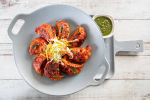 Veg Achari Momos 8pcs