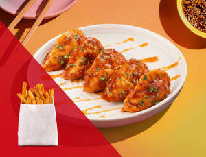 Choice of Pan Tossed Momos + French Fries