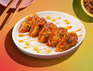 Chicken Tikka Pan-tossed Momos