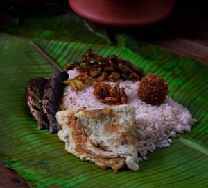 Pothichoru [non veg] with egg fry fish fry