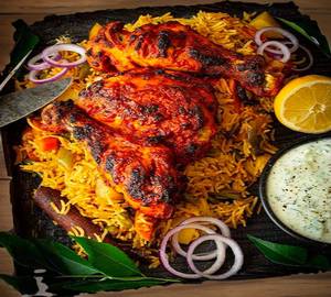 Chicken biryani + chicken 65 [150 grams] + boiled egg + raita