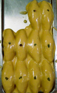 Nolen Gur Channa Puli Pitha