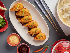 Steamed peri peri momos [5 pieces]