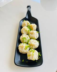 Chicken steamed momos [8 pieces]