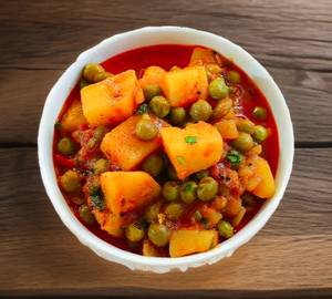 Aloo Matar + 6 Butter Roti + Raita + Salad + Papad