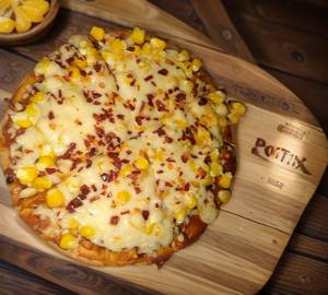 Corn and cheese pizza