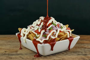 Schezwan Cheese Nachos