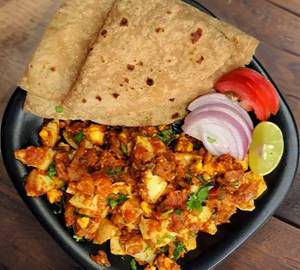 Paneer Bhurji Tikona Paratha