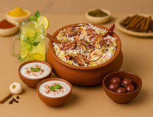 1 KG Royal Chicken Matka Biryani + Dessert + Drink