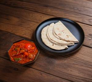 Paneer masala with [ 4 Pieces ]  roti + salad