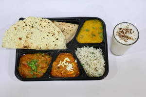 Punjabi Thali ( Paneer Tika Masala , Mix Veg , 4 Butter Chapati , Dal Fry , Jeera rice