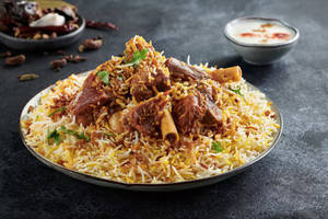 Special mutton biriyani (2pc mutton + egg) and salad combo
