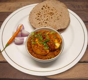 1 Egg curry  with 4 Roti