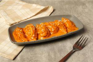 Chicken dynamite steam momos