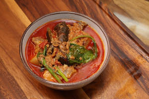 Smoked Pork With Anishi Large Paste Of Fermented Yam Leave