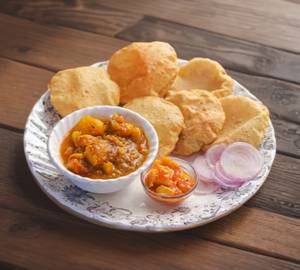 Puri 5pic+aalu jira ke sabji+salad