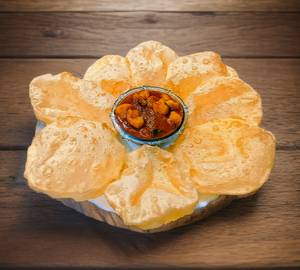 Luchi (8 pieces) & veg alu curry