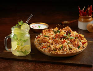 Half KG Paneer Mughal Biryani + Lemonade + Raita