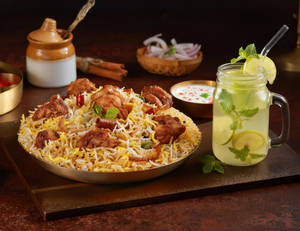 Half KG Chicken Mughal Biryani + Lemonade + Raita