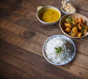 Dal tadka with jeera rice and aalu bhaji