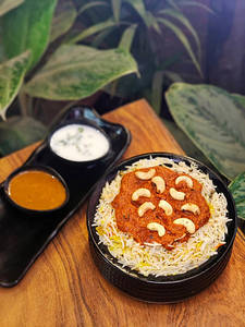Kaju Biryani + raita + gravy 