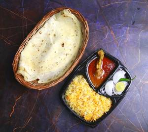 1 Pc Chicken Korma + Biryani Rice +2Pc Roomali Roti or 1Pc Mughlai Paratha + Salad + Raita