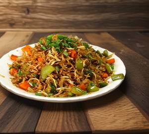 Schezwan egg rice and noodles