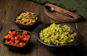 Keerai Soru Served With Potato Varuval And Poriyal