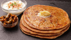 2 Plain Tawa Parantha With Dahi And Butter