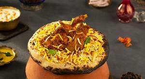 Handi mutton dum biryani(1/2 kg) (4 pcs)