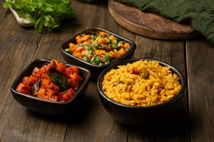 Paruppu Soru Served With Potato Varuval And Poriyal