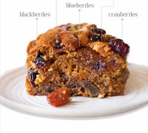 Freshly baked classic Fruit and nut cake with chocolate chunks.no palm oil, made in olive oil. [700g