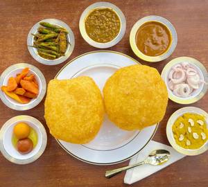 1 Plate Poori Chole + 2 Pc Gulab Jamun/1 Plate Suji Halwa